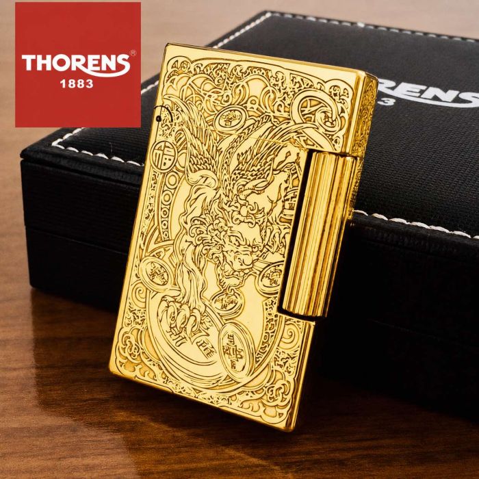 Колекційна бензинова запальничка Thorens у золотому кольорі з витонченим східним гравіюванням (Дракон та символи)